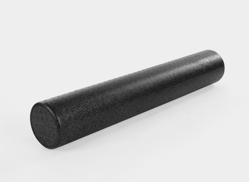 Black extra-firm foam roller for muscle relief.