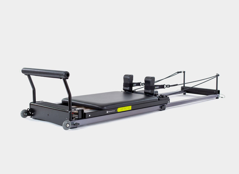 Metro-IQ Pilates Reformer for a comprehensive workout.