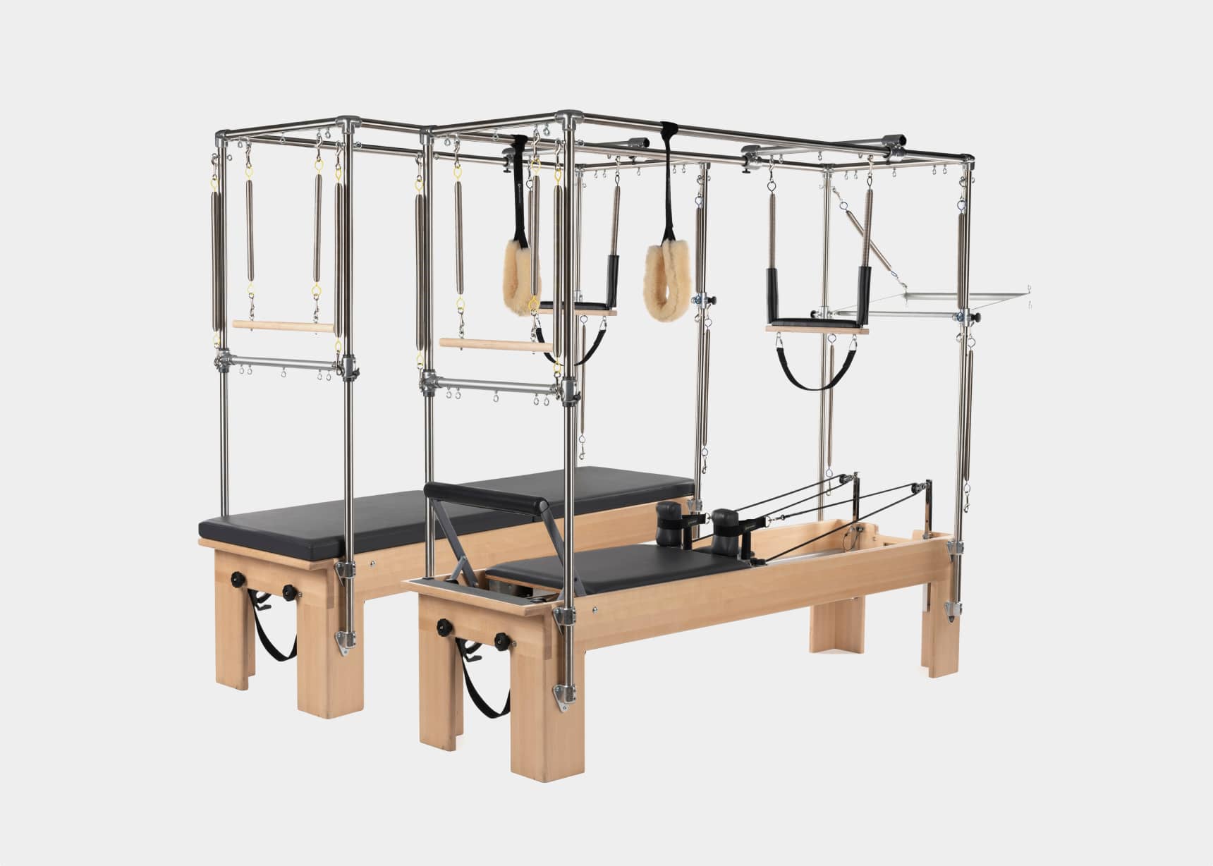 Image showcasing the combination of a Pilates Reformer and Trapeze setup.